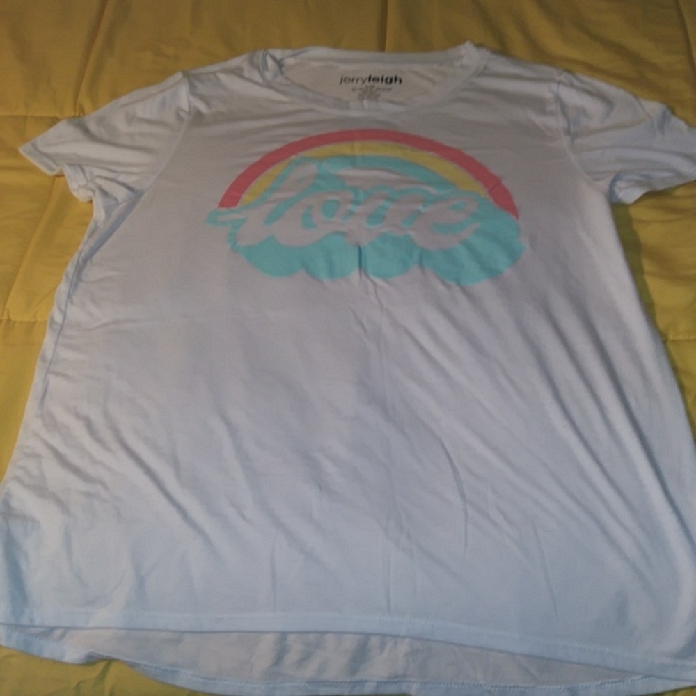 A plain white shirt with the word love